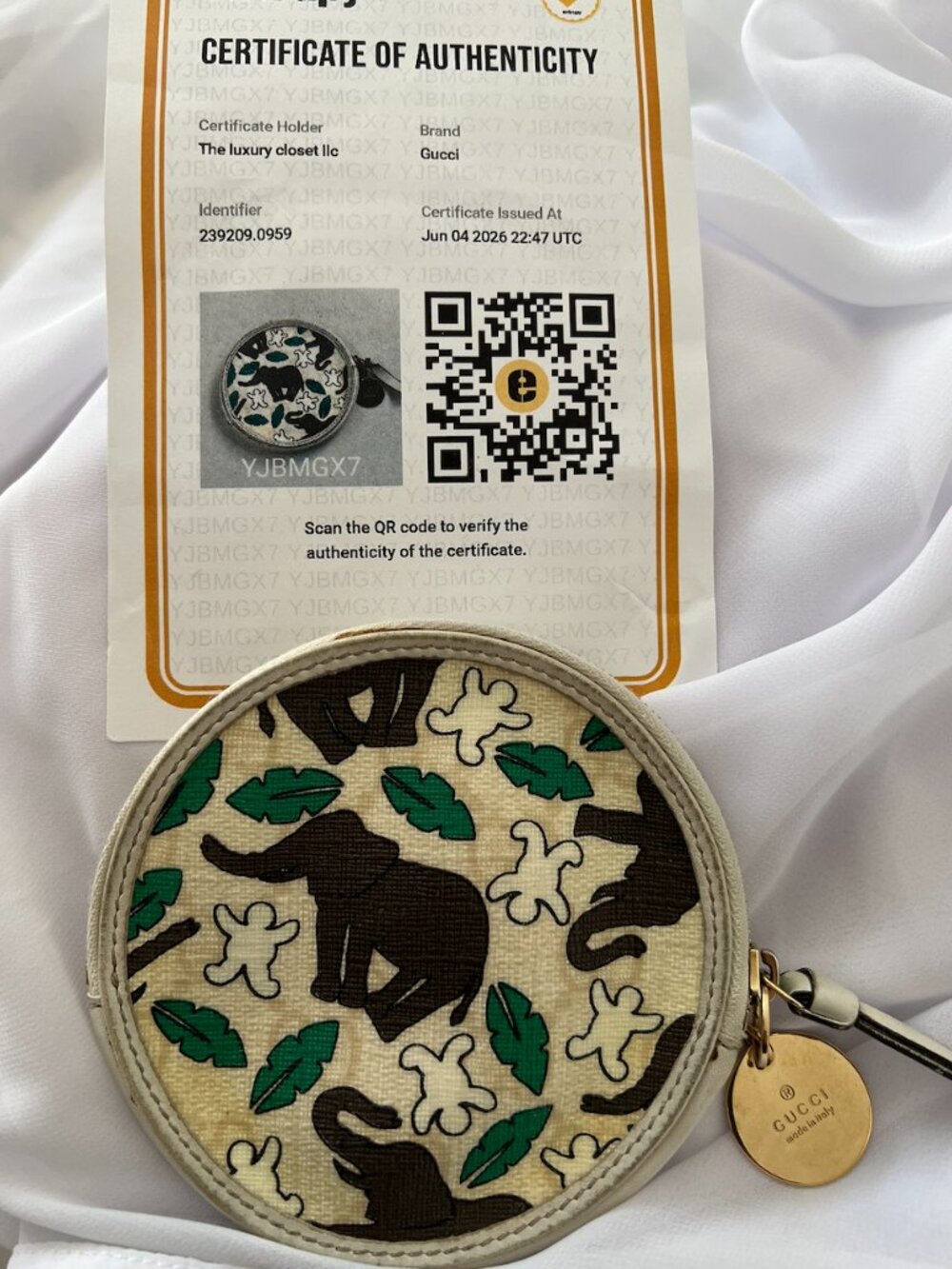 rare Gucci x UNICEF limited edition round coin purse